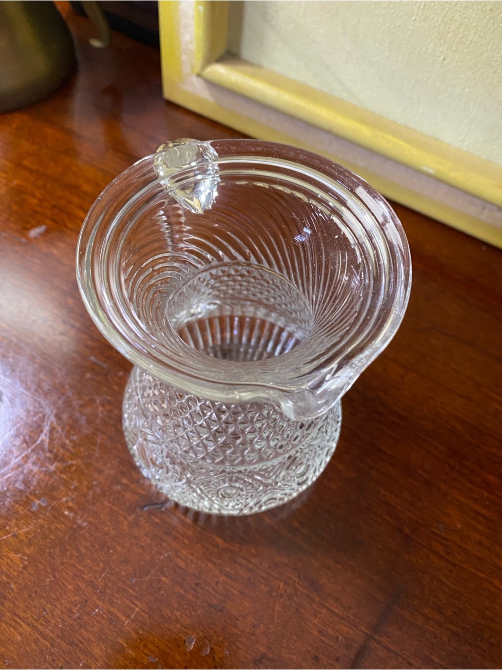 Pressed Clear Glass Creamer with Diamond & Swirl Pattern.
It GLOWS.